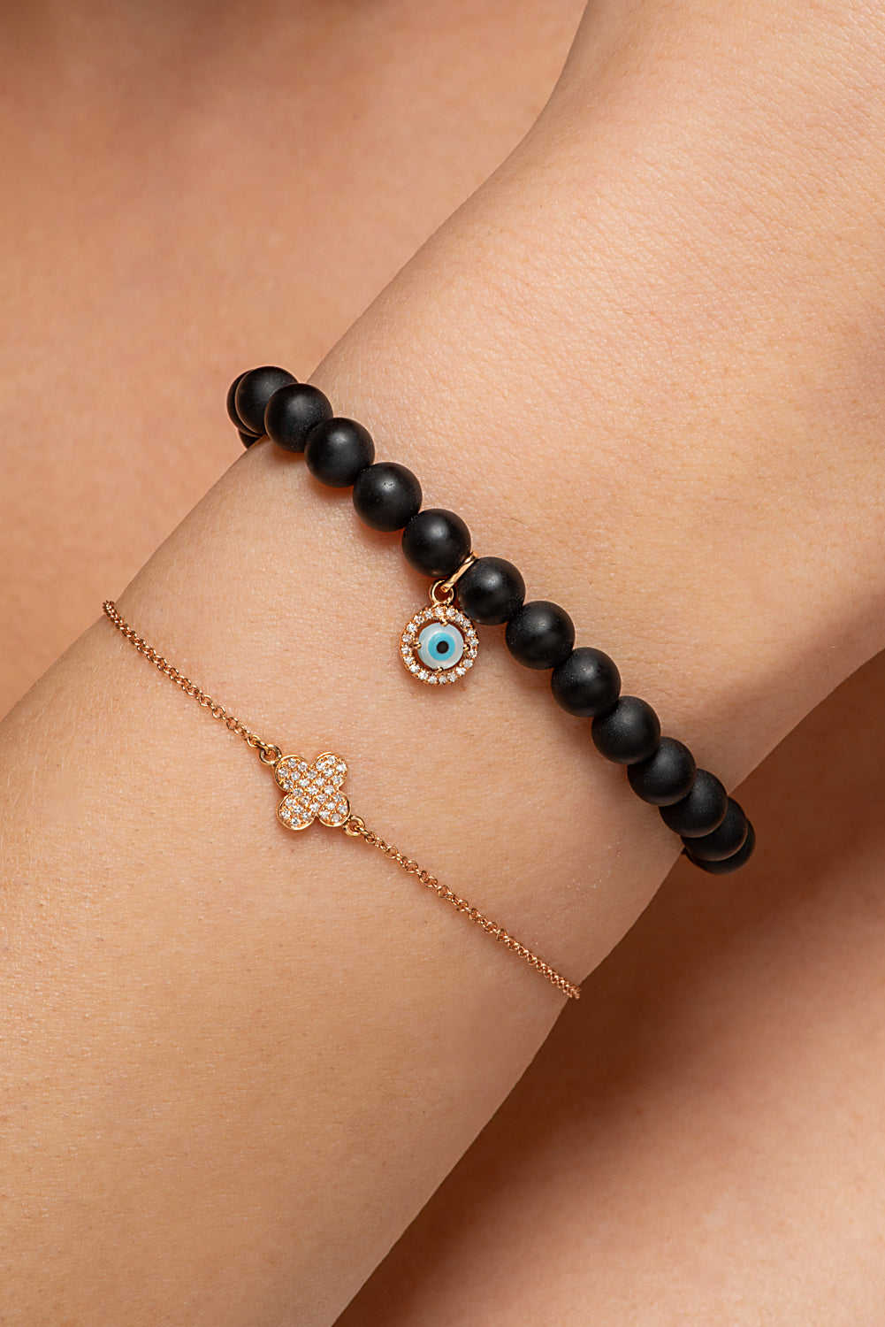 Gold and Diamond Evil Eye bracelet with onyx beads
